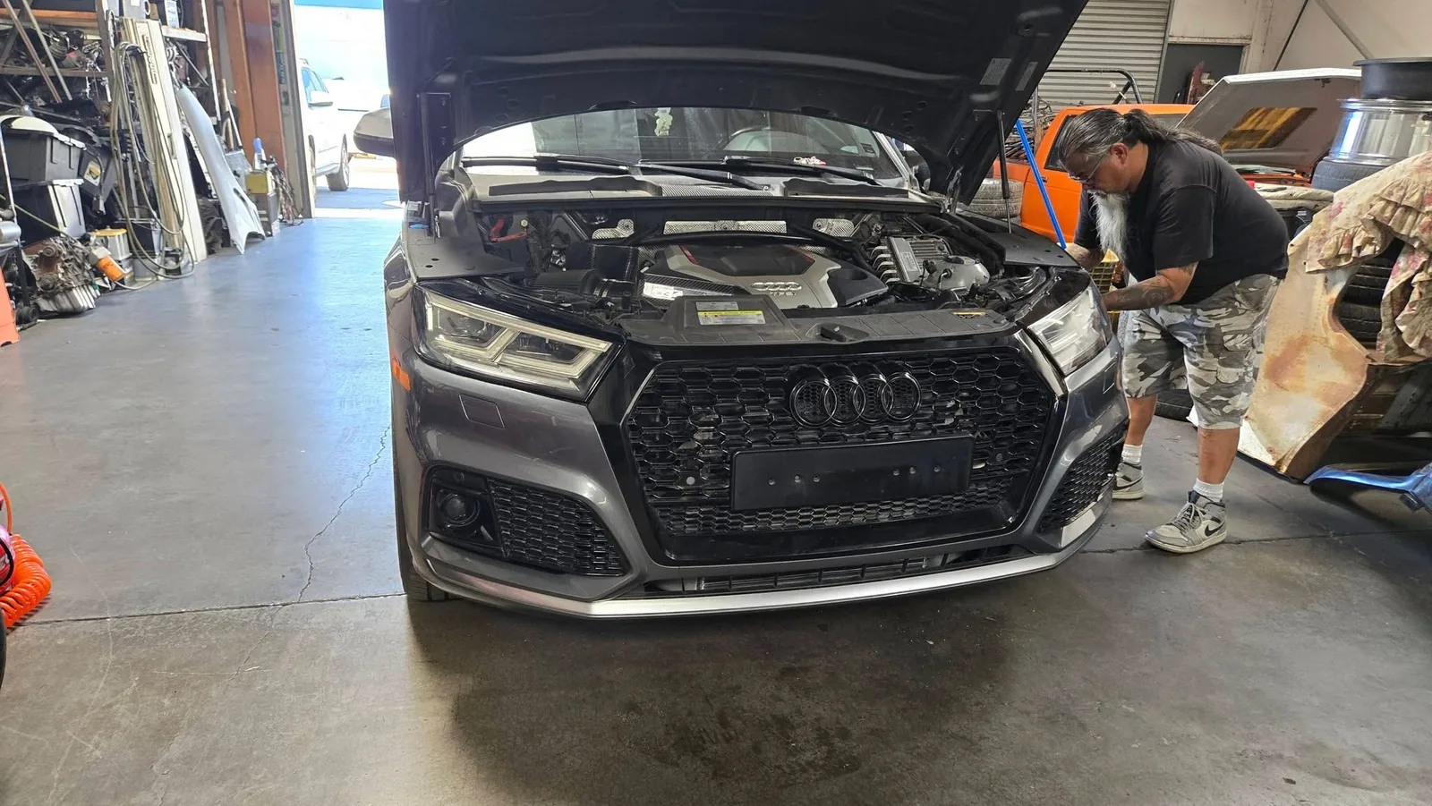 Technician working on an Audi at Elledge Auto