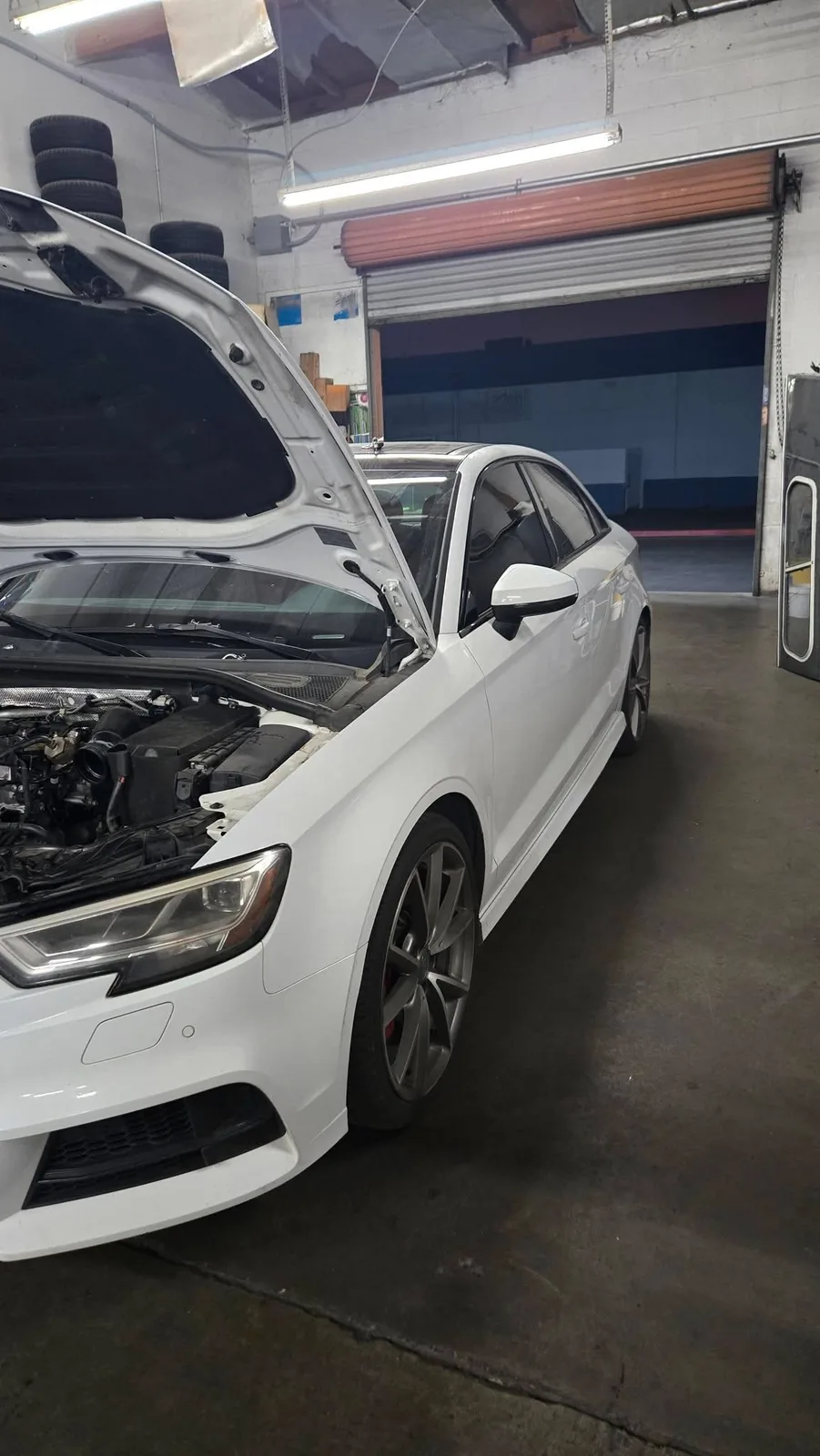 White Audi in shop